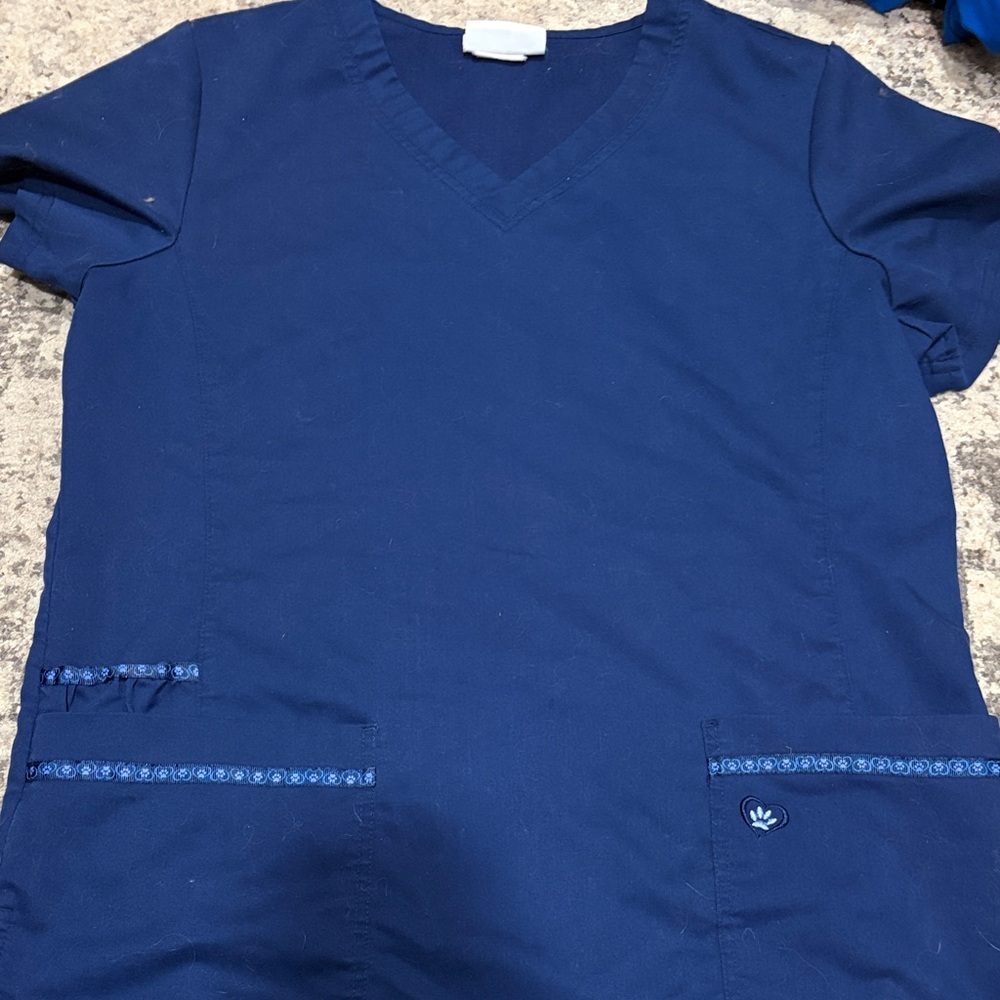 Navy blue paw print scrub top